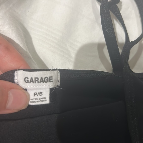 Brand new solid black cropped cami top with adjustable straps. (Garage) size SP - Picture 3 of 3
